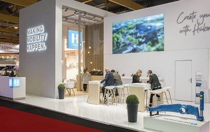 HÜBNER präsentiert sich auf der Busworld in Brüssel.